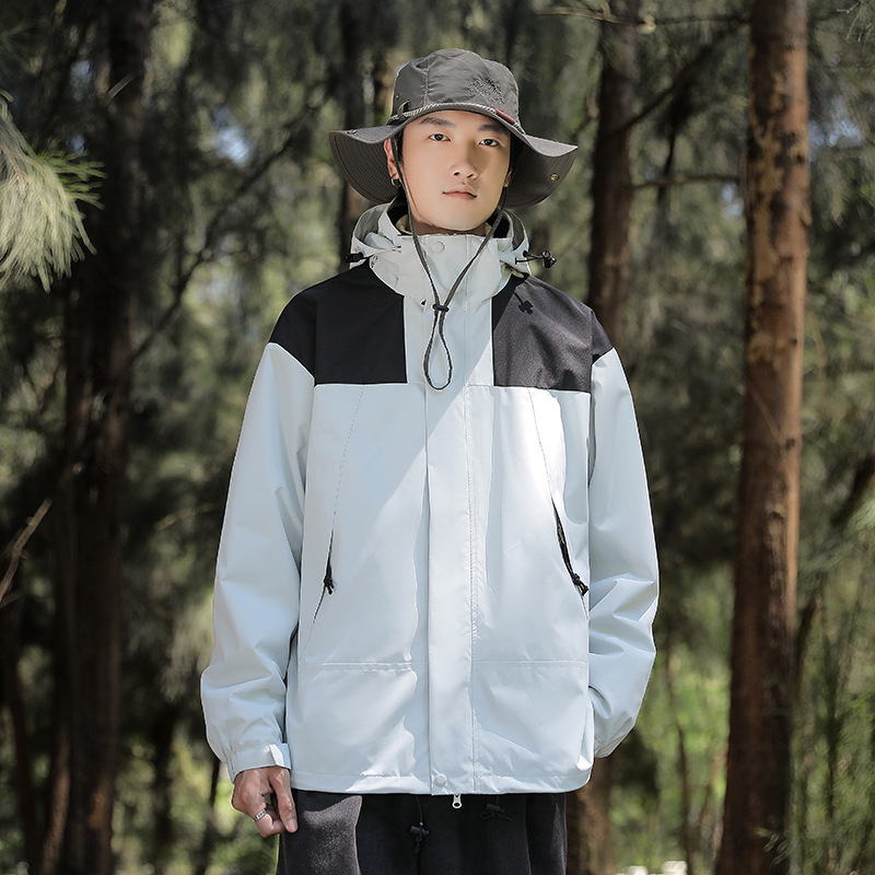 Chaqueta de invierno al aire libre para hombres y mujeres tres en uno de dos piezas de lana engrosada chaqueta de alpinismo a prueba de viento al por mayor en vivo