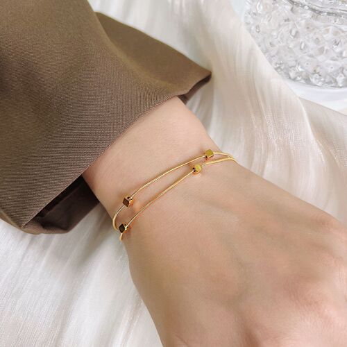 Advanced simple gold three-dimensional small square double-layer snake bone bracelet for women 18k gold-plated titanium steel non-fading ins fashion
