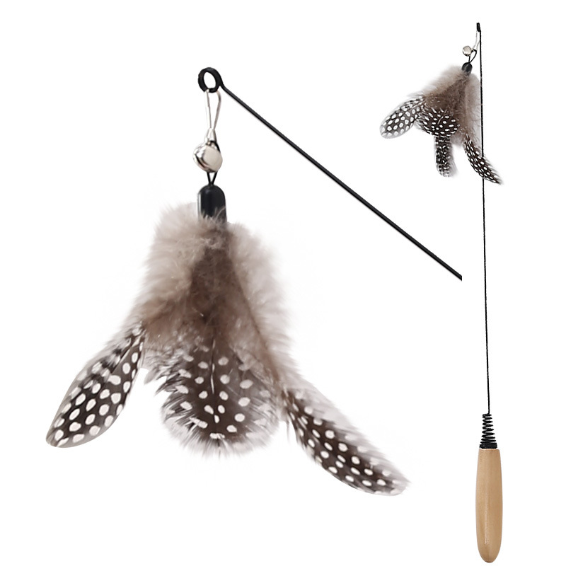 Suministros para mascotas Amazon nuevo mango de madera primavera pluma divertido gato palo campana pluma divertido gato juguete al por mayor