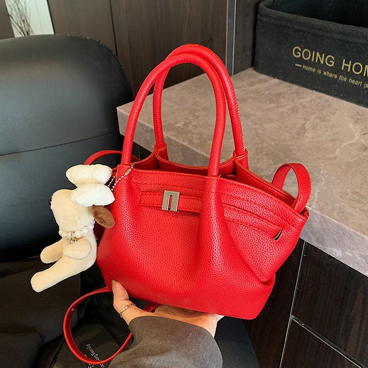 Bolso de cubo de estilo explosivo de moda para mujer, nuevo bolso de hombro de estilo occidental de todo fósforo 2025, bolso de mensajero súper caliente con pliegues de moda