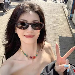 韓国版レトロ豹紋茶墨緑色ココア鏡猫眼gmサングラス女性の丸い顔がやせて高級感があるサングラス
