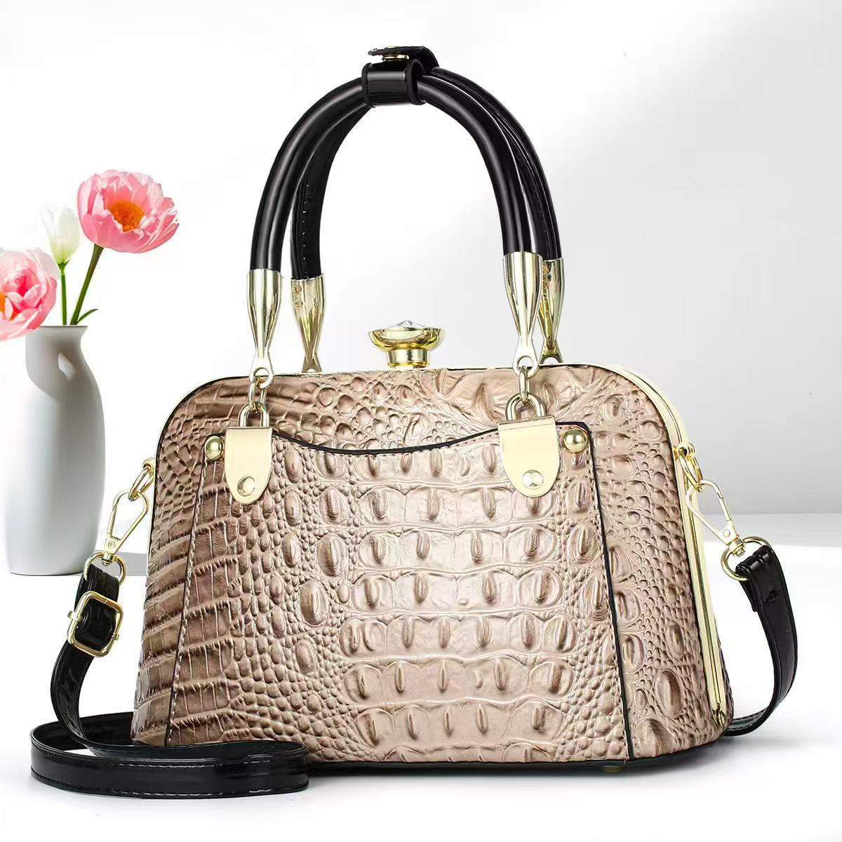 Bolsos de mujer verano nuevo estilo bolso de madre bolso de hombro de mediana edad bolso de mensajero de nicho de regalo de todo fósforo