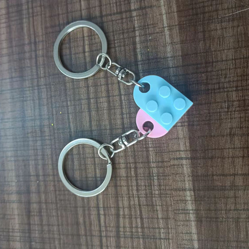 Europa y América Nueva spliced dividir bloques de construcción pareja amor llavero Comercio electrónico transfronterizo Lego rompecabezas llavero