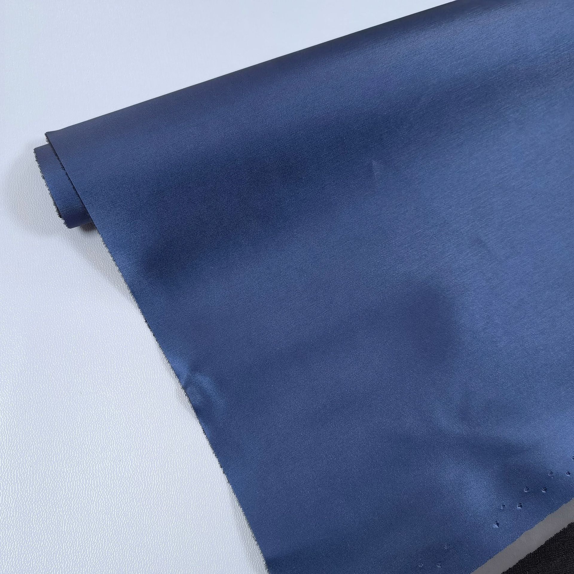 现货批发pu革弹力拉丝纹雨丝纹人造革眼镜盒专用菜谱打印皮革面料