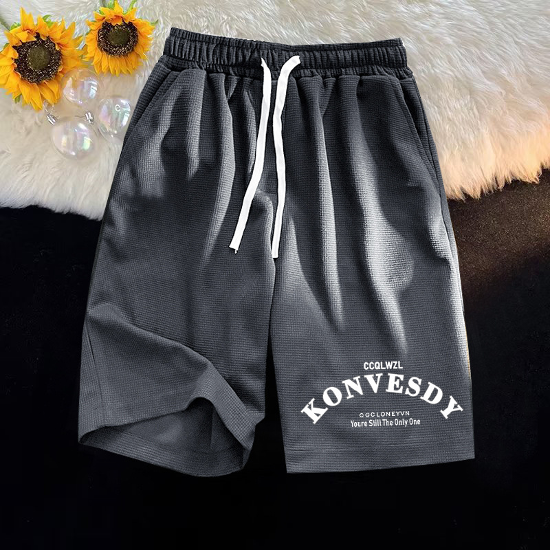 Waffle casual minimalista para hombres, camiseta de manga corta de verano, pantalones cortos para hombres con un conjunto de ropa de moda.