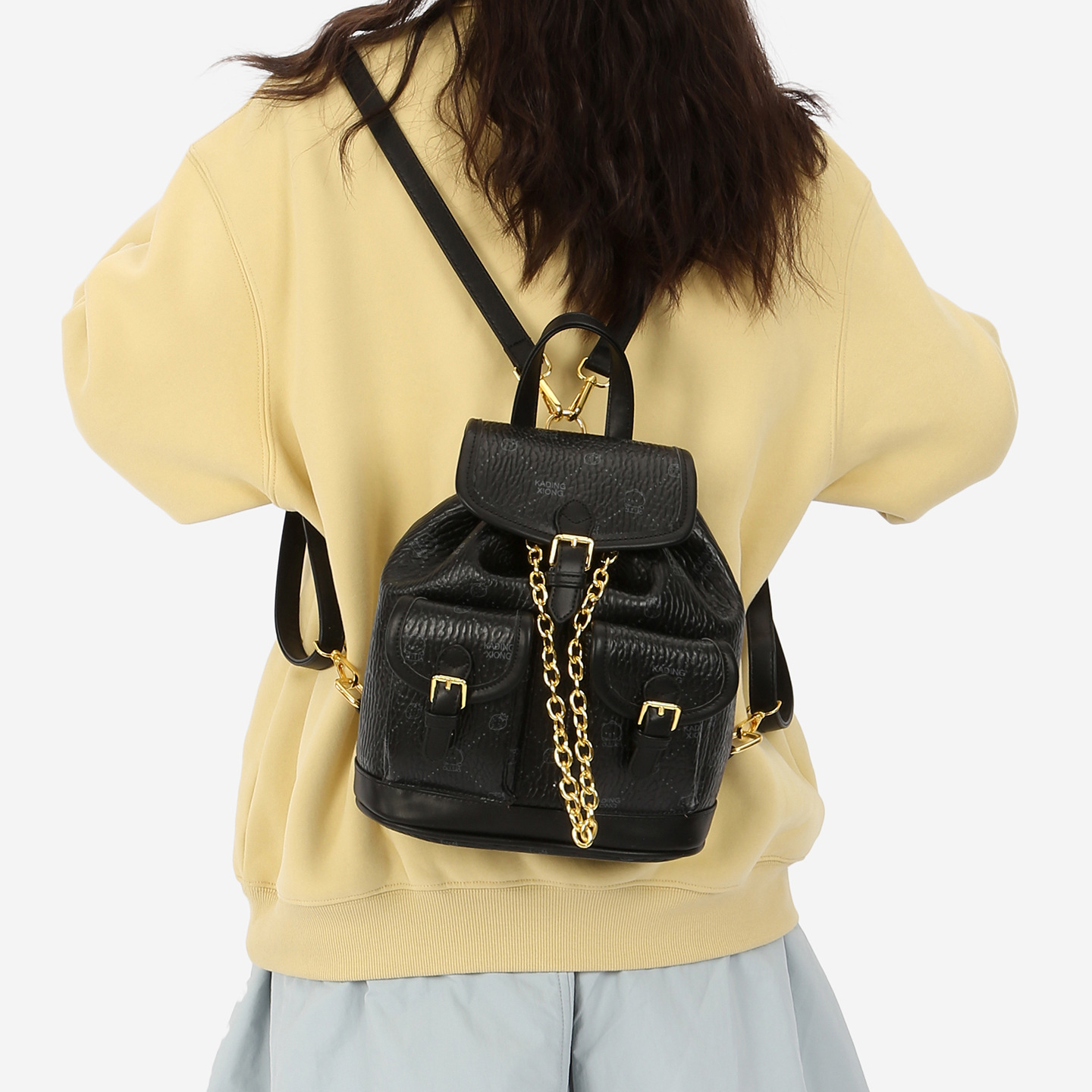 Cute oso impresión mochila de chicas extranjera cuerda de tracción para trabajar bolsas de mujer 2026 nueva mochila transfronteriza mujer