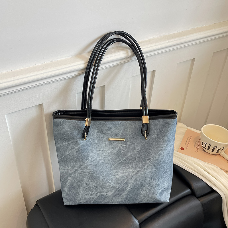 2026 nuevo retro de gran capacidad bolso de mano de hombro para mujeres de alta calidad sensación de viaje bolso de moda versátil bolso simple