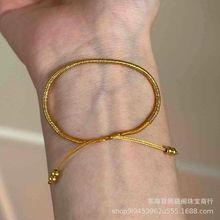 小众轻奢黄金色圈圈编织手链女新款手工盘缠手绳礼物送女友
