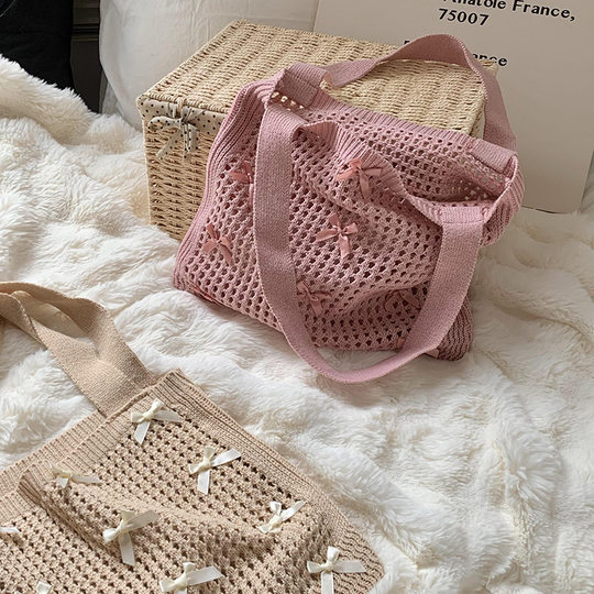 Shoulder bag messenger bag women's versatile 2025 new bow element simple hollow knit bag handbag wholesale