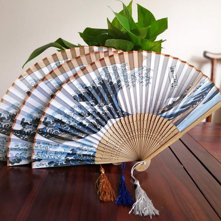 Hay en stock Kanagawa ola fractura de bambú fan canción Xiaozhu transfronterizo pequeño ventilador plegable serie japonesa SEDA-como ventilador de Bambú