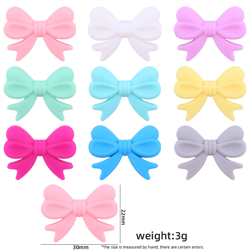 Bebé suministros de dibujos animados de silicona arco pequeño mordedor creativo bebé pezón anti-gota cadena pulsera mordedor Accesorios