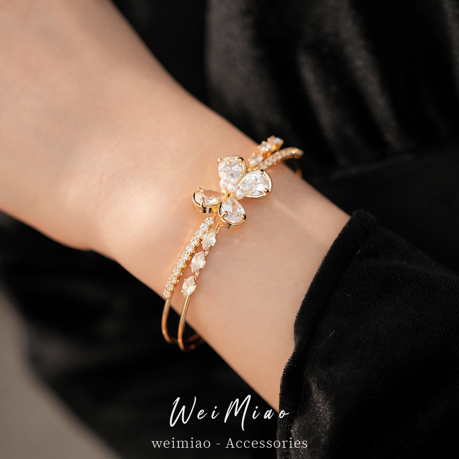 Zircon doble capa de mariposa hueco brazalete de apertura personalidad temperamento pulsera de moda lujo ligero nicho joyería al por mayor