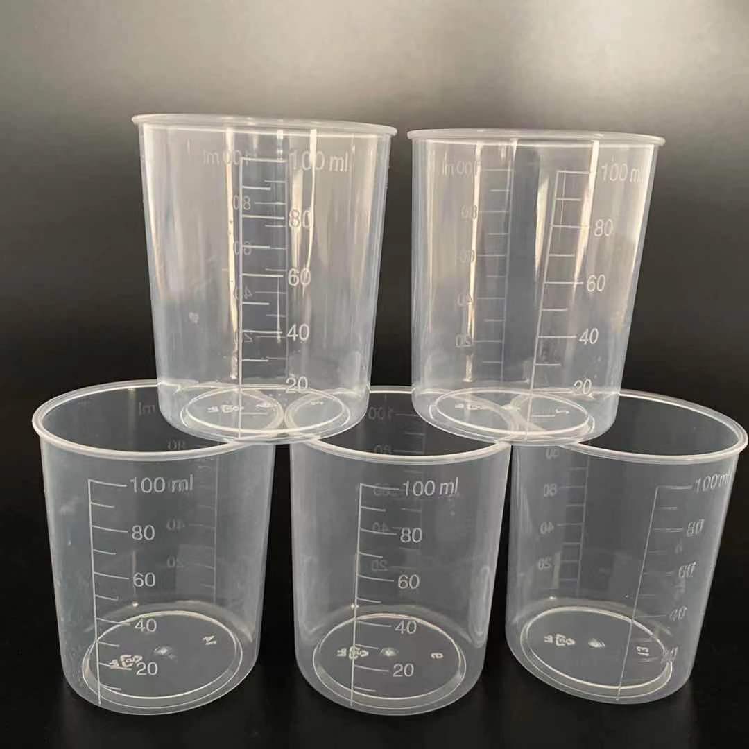 Taza de medición al por mayor 50 ml Taza de medición de plástico 100 ml Taza de precipitados de plástico con taza de plástico graduada