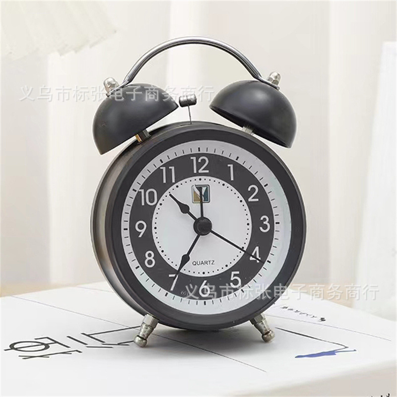 Moda creativa Reloj despertador de timbre de metal de 3 pulgadas Reloj despertador silencioso Dormitorio de niños Dormitorio de estudiantes Reloj luminoso al por mayor