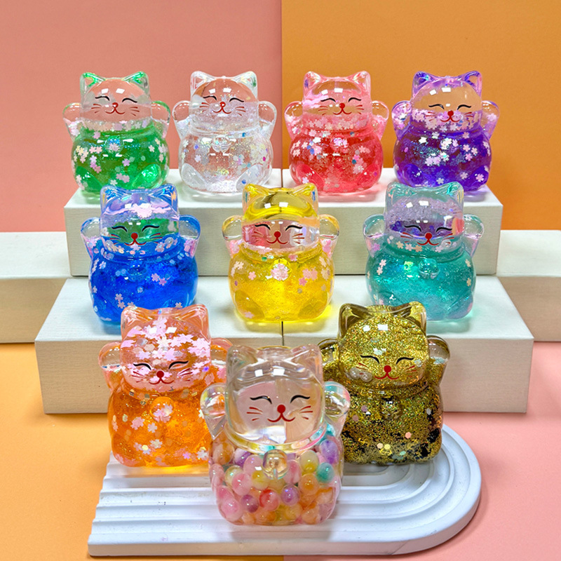 2025 trembles explosions luminous flash lucky cat creative oil quicksand desktop ornaments acrylic jewelry wholesale