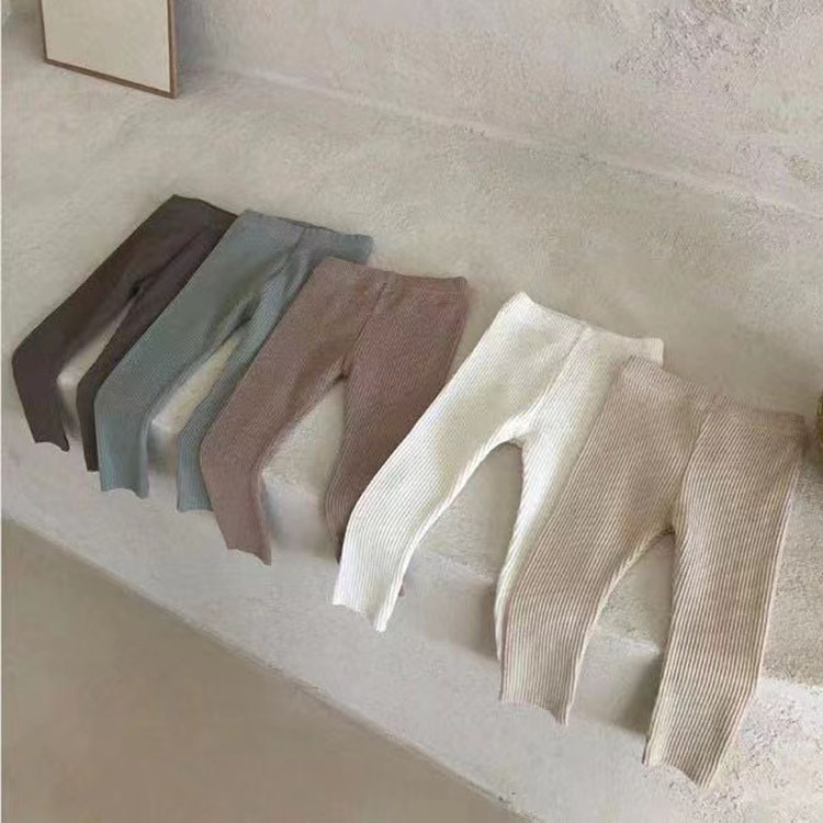 Pantalones para bebés modelos de primavera y verano para hombres y mujeres pantalones de color sólido para bebés leggings exteriores leggings elásticos para bebés recién nacidos