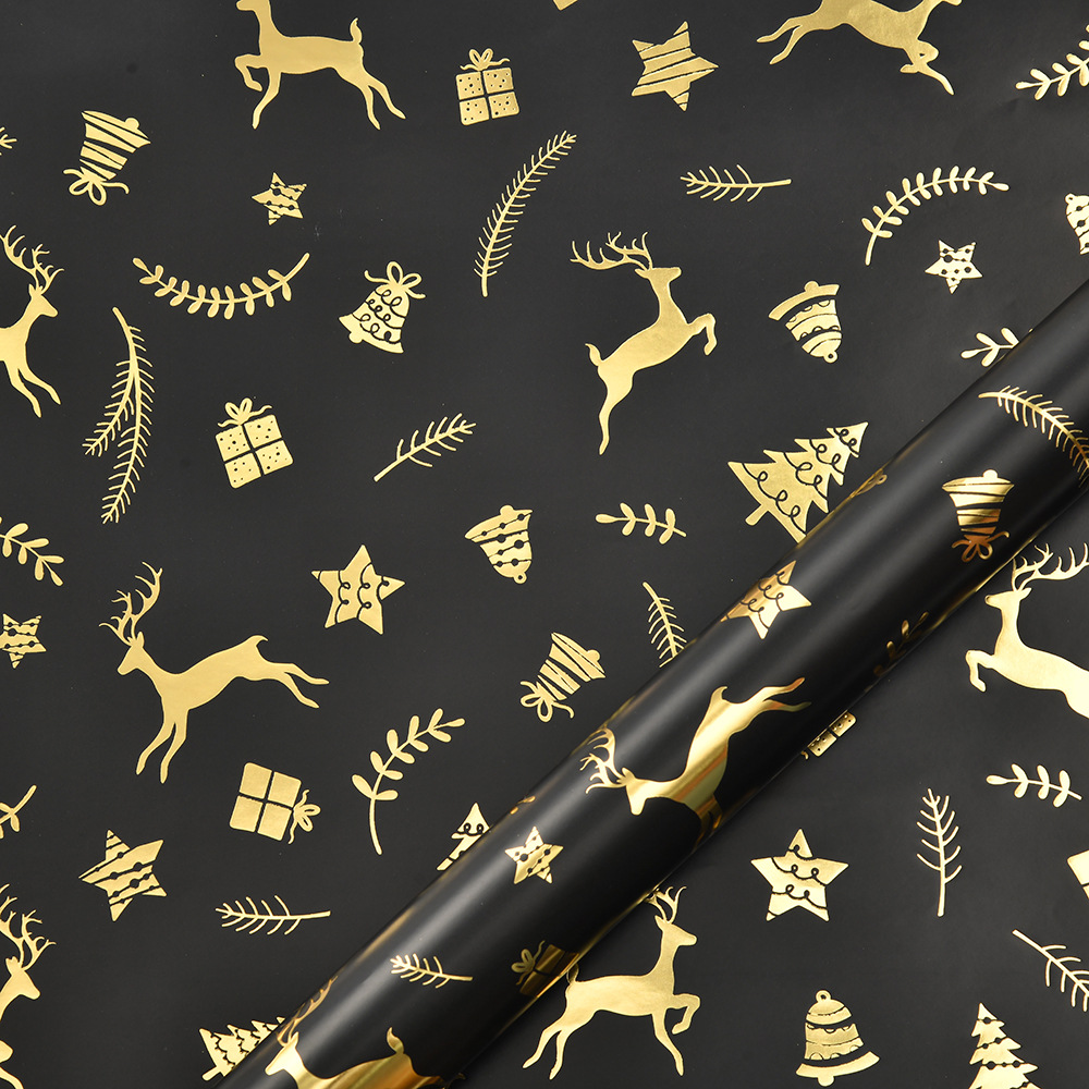 Nuevo papel de embalaje de Navidad estampado retro oro negro alce copo de nieve regalos de árbol de Navidad papel de regalo al por mayor