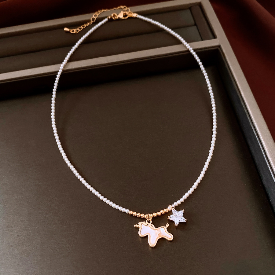 Oro verdadero eléctrico galvanis colgante de piedra pony pendientes collar ligero lujo nicho universal conjunto temperamento alta sensación de joyería mujer