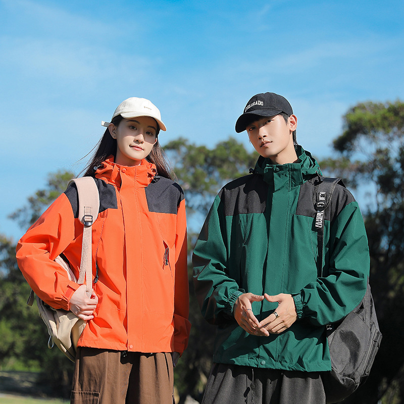 Primavera y otoño deportes al aire libre pareja de moda casual sombrero desmontable color a juego hombres y mujeres chaqueta delgada entrega en vivo