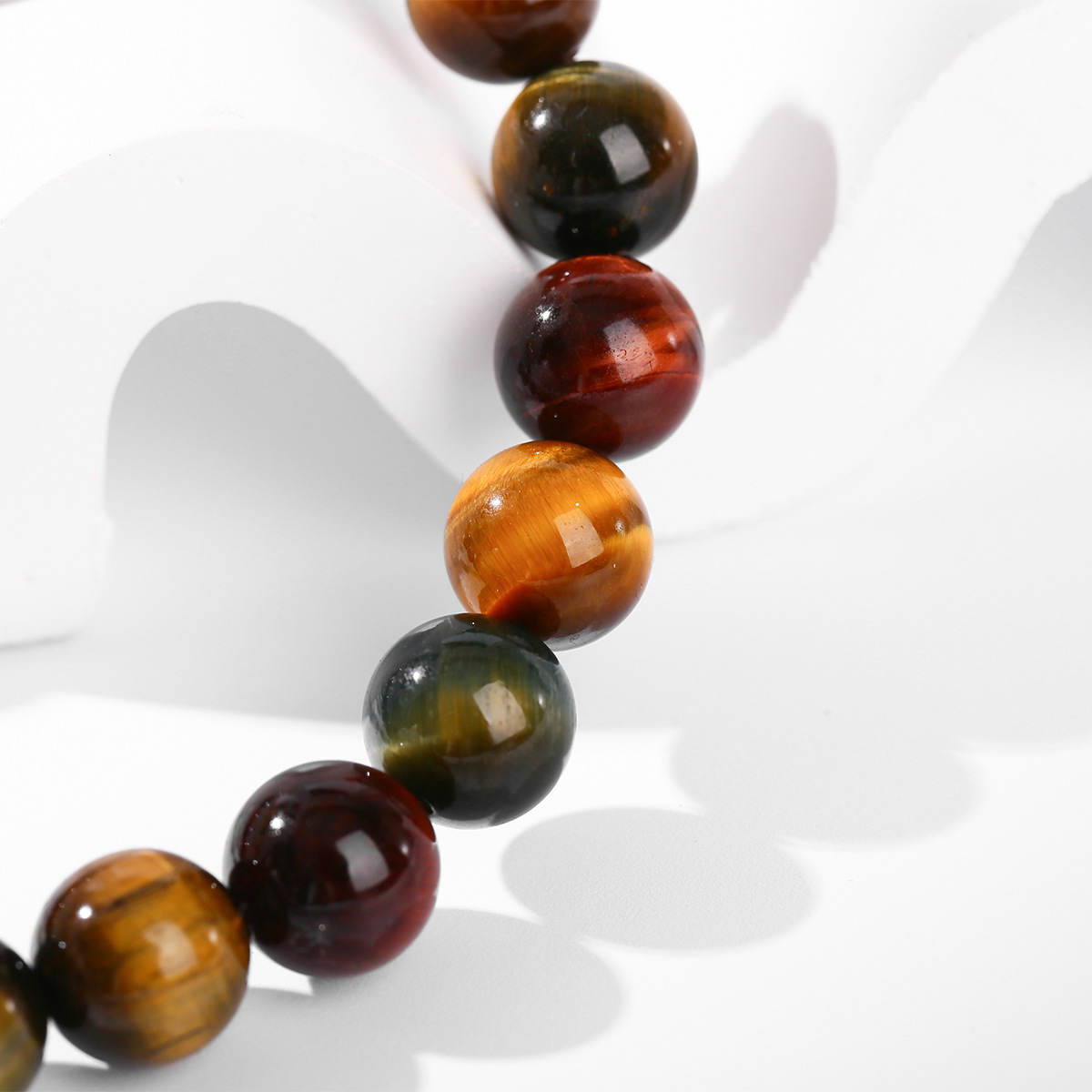 結晶東ジュエリー稲妻目男女スタイルの個性的なトレンド単輪ビーズブレスレット卸売り5a三色虎眼石手串