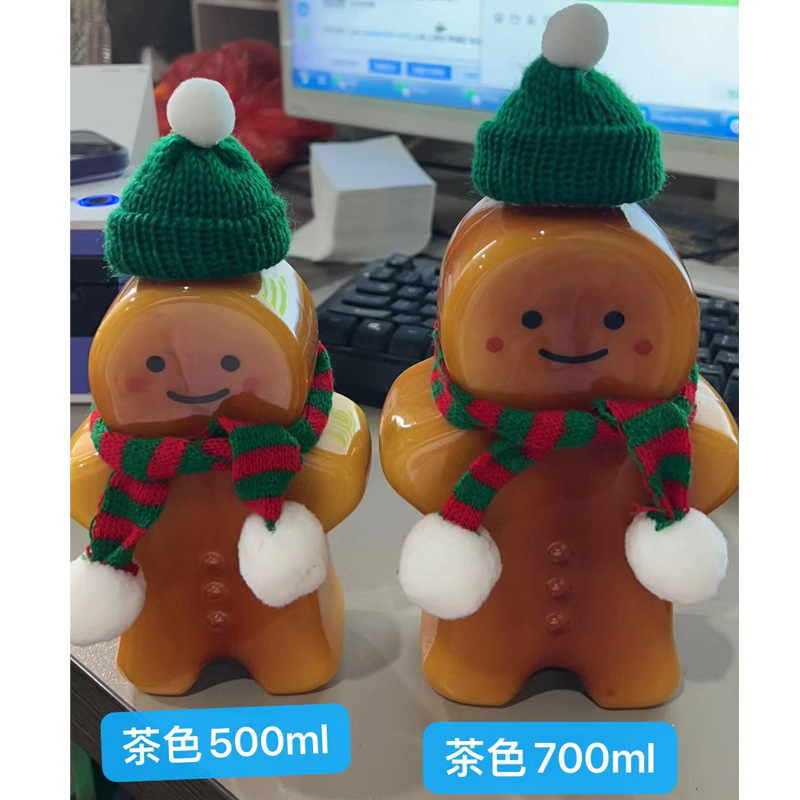 Pastel de jengibre de dibujos animados Hombre taza de té de leche en forma de botella de plástico desechable jugo botella de bebida PET para llevar jugo de leche botella de té