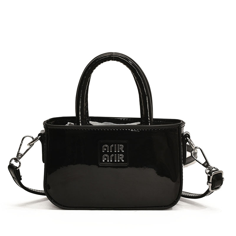 Bolsa de hombro coreana para niñas de color sólido, bolso láser de moda, mini bolso para bebés, 2025 nuevo bolso para niños