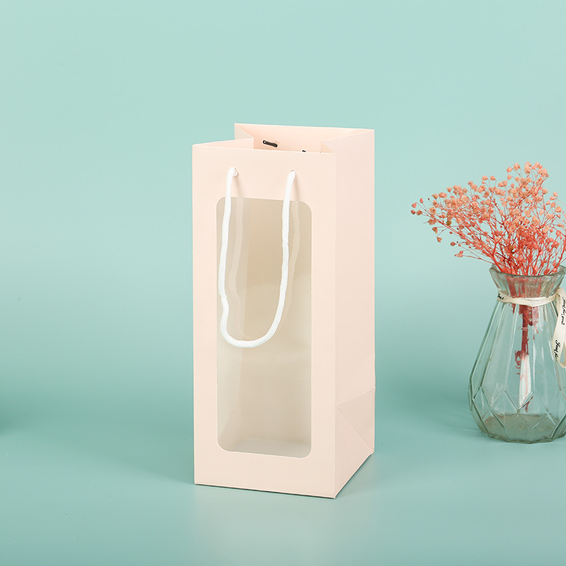 Spot celebridad de Internet ventana abierta bolsa de regalo transparente bolsa de embalaje de flores regalo rosa recuerdo ventana de regalo vino tinto