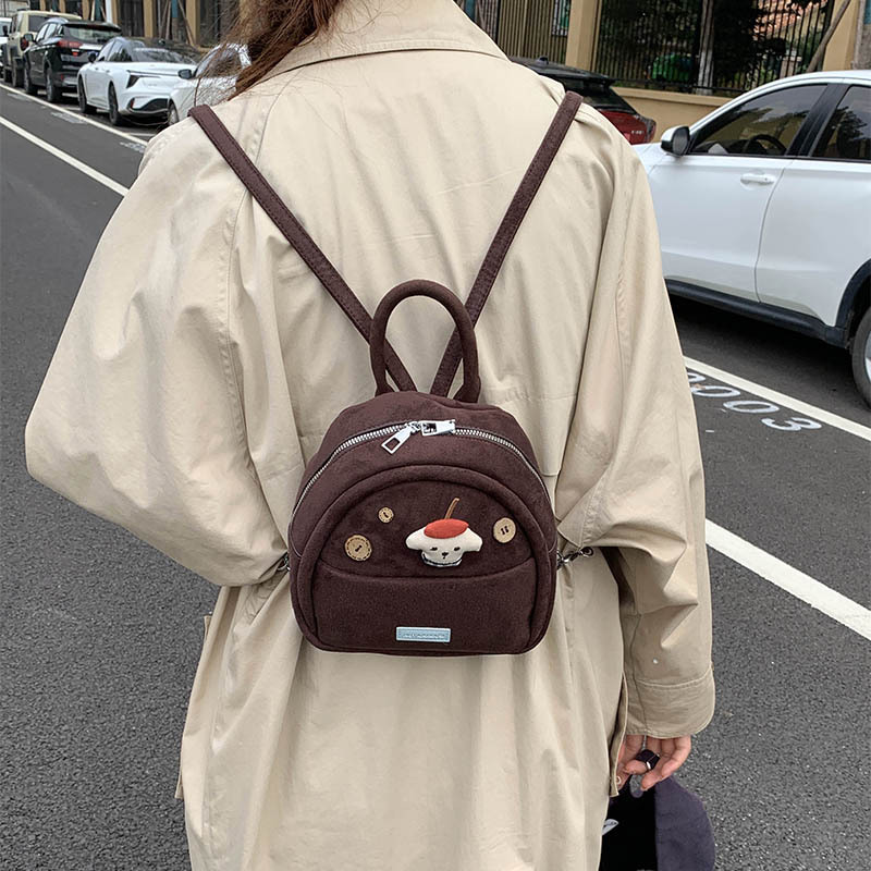 Caricatura lindo muñeca mochila de niña 2025 nueva moda mini mochila de comercio exterior transfronterizo mochila esmerizada mujer