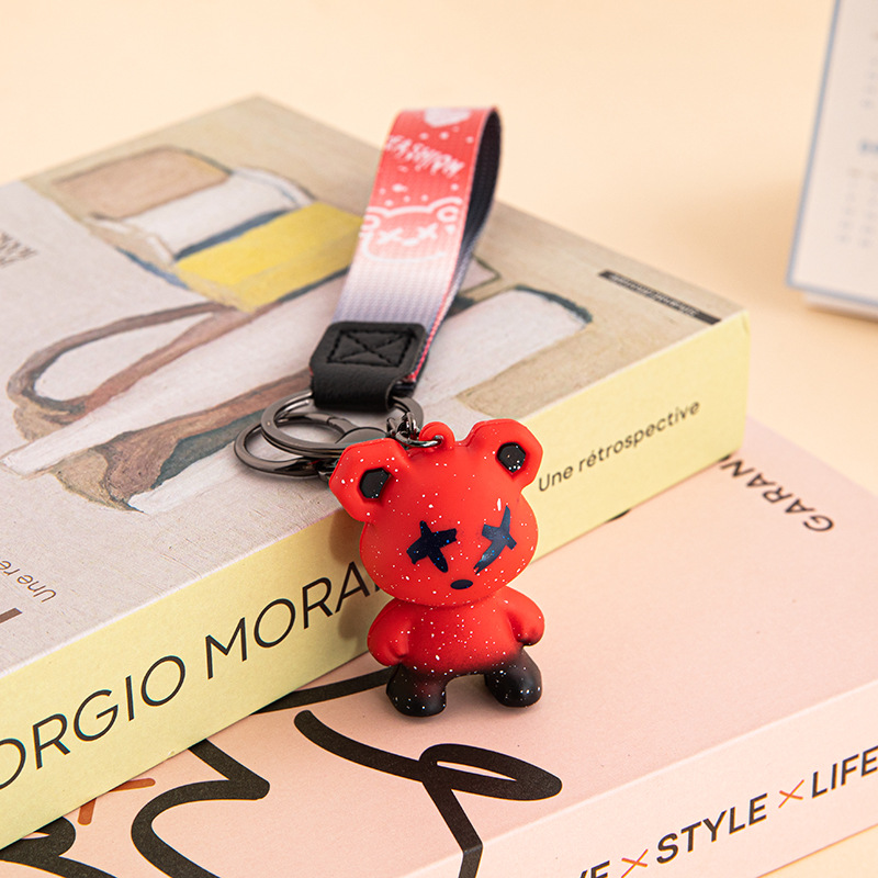 Creativo, colorido, violento, muñeca de oso de dragón, método de lucha de perros, llavero de muñeca de moda, llavero de personalidad de coche
