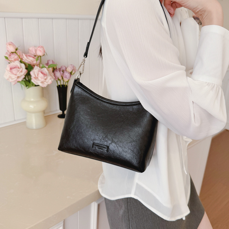 Bolsa de brazo popular diaria coreana de nicho para mujeres 2026 nueva moda mochila de hombro para viajar bolso cuadrado simple