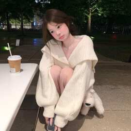 温柔甜美大翻领白色针织开衫上衣女早秋巨好看灯笼袖宽松毛衣外套