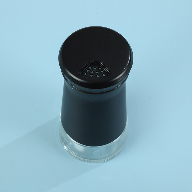 Fábrica al por mayor botella de condimento de vidrio de acero inoxidable cocina esparcidor de pimienta porosa giratoria sal de mar