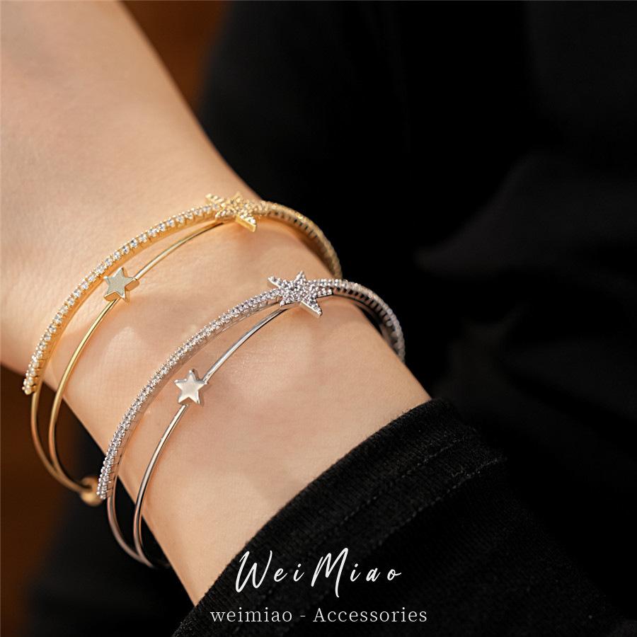 El oro real, la estrella de piedra, la luna, la doble abertura cruzada, la pulsera de personalidad, la pulsera de nicho, el lujo ligero