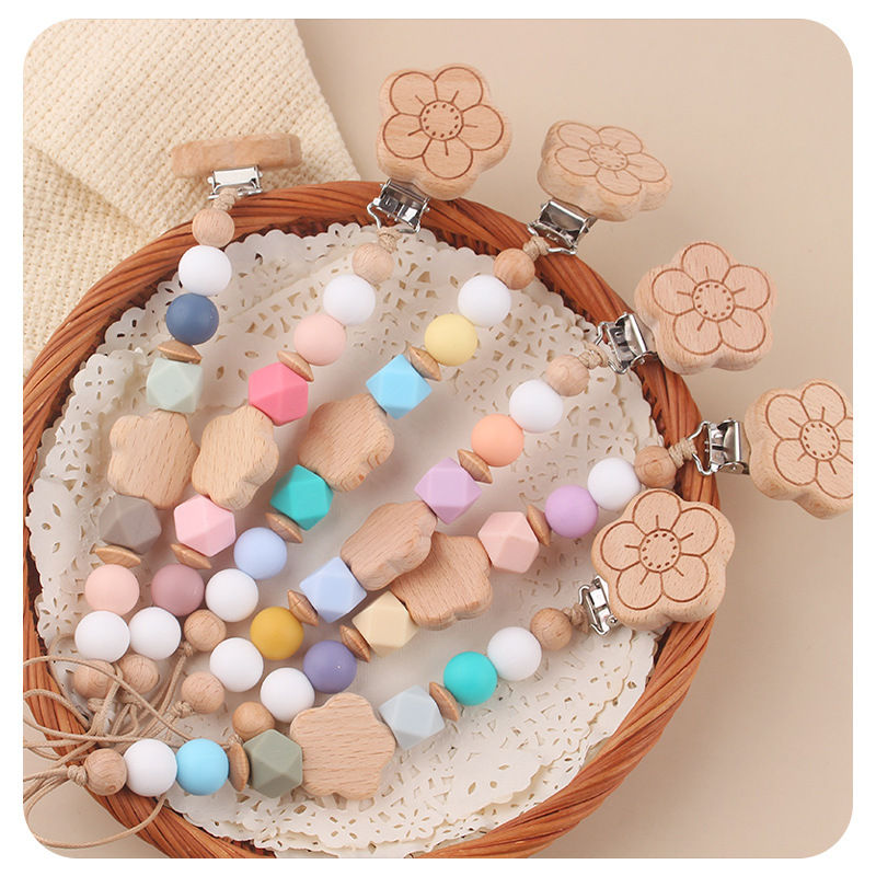 Productos para bebés flores de beech chupeta clips de dibujos animados para bebés flores de beech mordida de dientes molares chupeta cadena de prevención