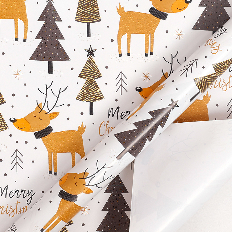 Papel de regalo navideño clásico y popular de gran tamaño con diseño de dibujos animados y temática navideña para envolver regalos.