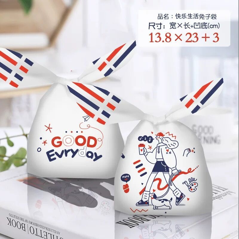 Una variedad de regalos de boda lindos oreja de conejo bolsa de caramelo bolsa de galletas caramelo leche azufaifo bolsa de embalaje al por mayor 50