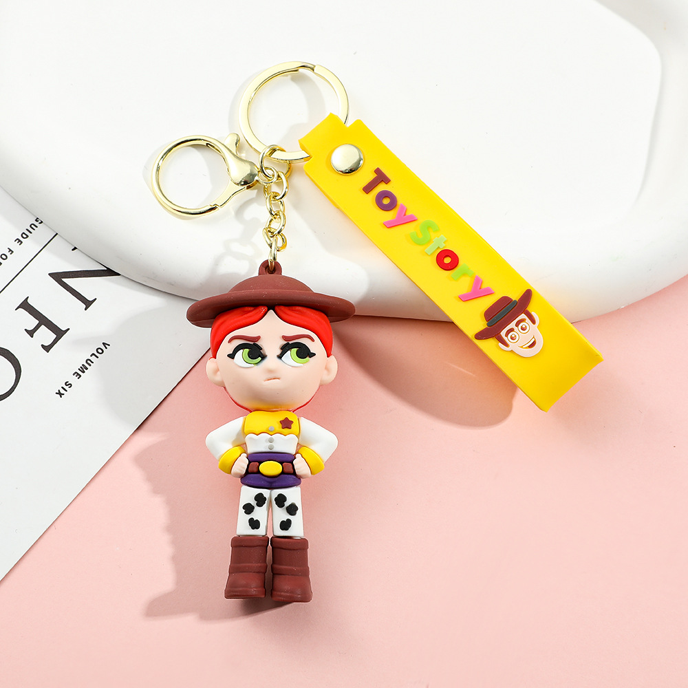 Llavero de silicona de Toy Story, el popular dibujo animado, con personajes como el alienígena de tres ojos, Buzz Lightyear y el oso Lotso, ideal como adorno para bolso.