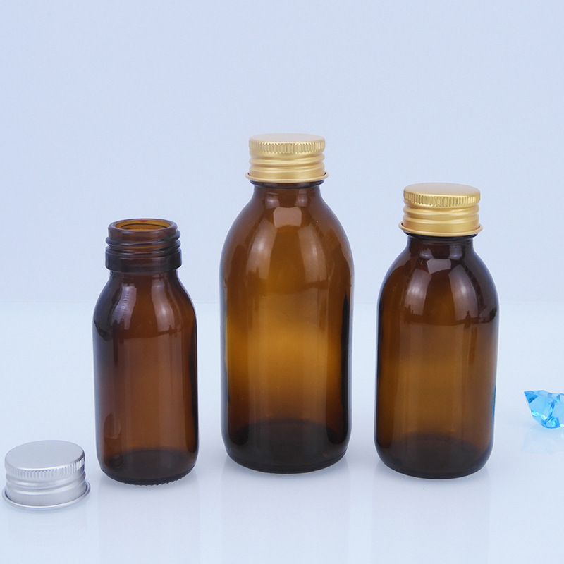 茶色のガラス製経口液体ボトル、茶色の薬用遮光シロップ包装サンプルボトル、密封酵素ボトル、健康薬ボトル|undefined