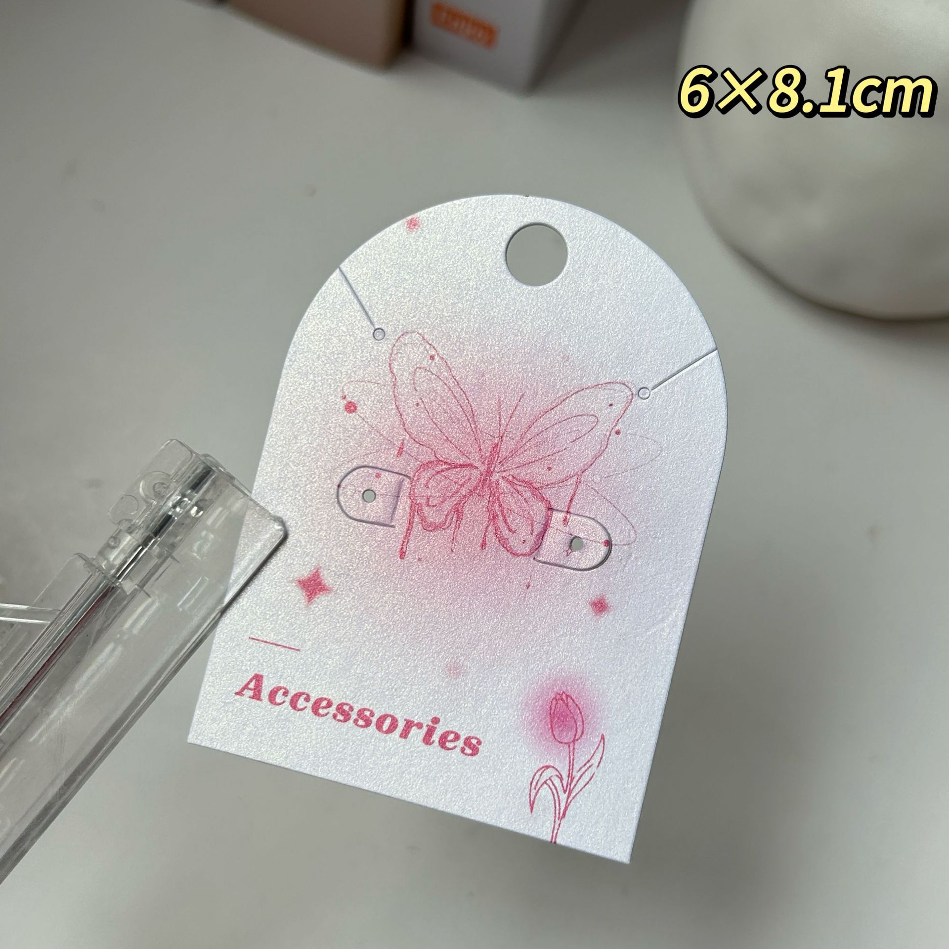 Pearlescent arched butterfly 6x8.1cm; spot jewelry card