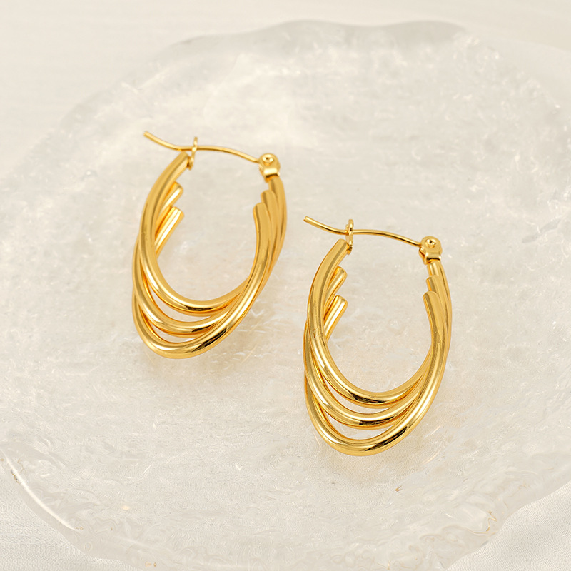 Pendientes de acero inoxidable dorado de 18k sin decoloración Pendientes de acero inoxidable de línea multicapa en forma de corazón Pendientes de hebilla ovalada mujer
