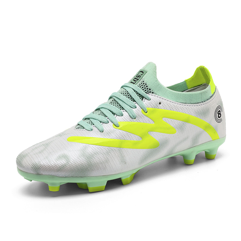 2025 nuevos zapatos de fútbol juveniles transfronterizos para hombres y mujeres clavos cortos largos de baja altura zapatos de fútbol vendidos directamente a la fábrica