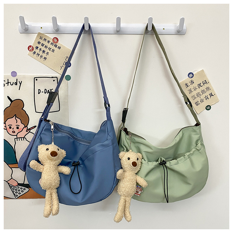 The new 2022 Little Bear canvas small bag for women is simple and versatile. The student dumpling bag is a trendy casual single-shoulder crossbody bag undefined