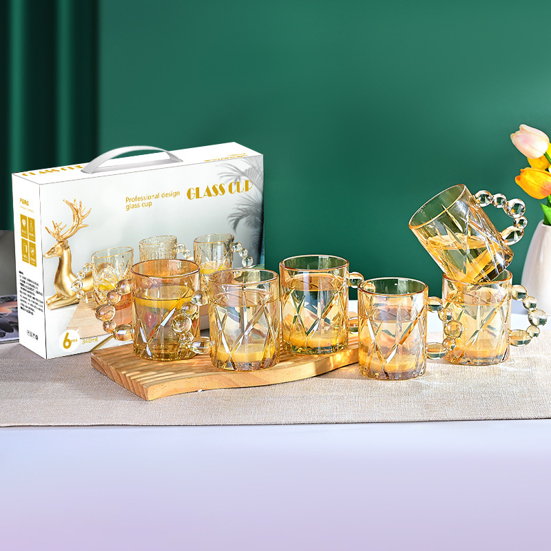 Taza de vidrio de perlas para engrosar taza de café doméstica de alto valor facial taza de leche de jugo fábrica de taza de agua al por mayor