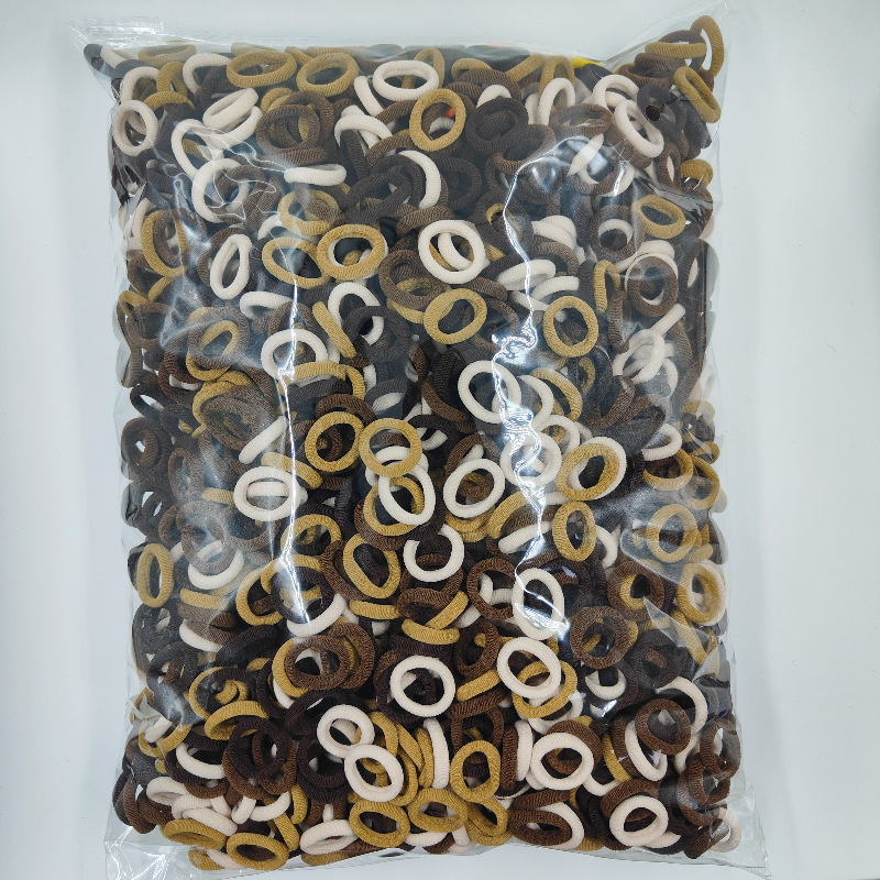 Fábrica directa sin costuras de alta elasticidad cuerda de cabeza para niños anillo de toallas OPP2000 anillo de cabello de cabello para bebés al por mayor