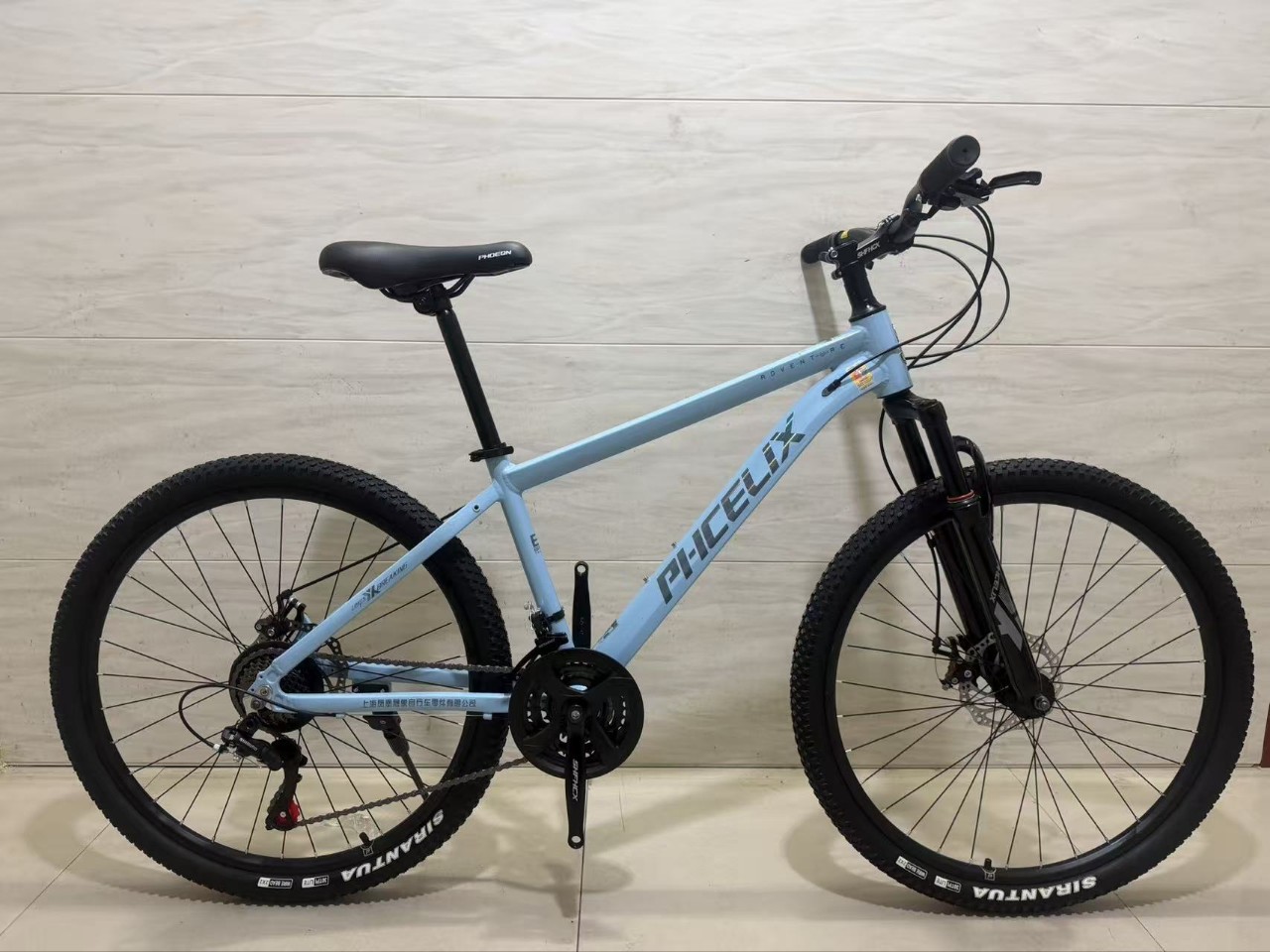 Bicicleta de montaña de 24 pulgadas 26 pulgadas 21 velocidades de amortiguación bicicleta de velocidad variable para hombres