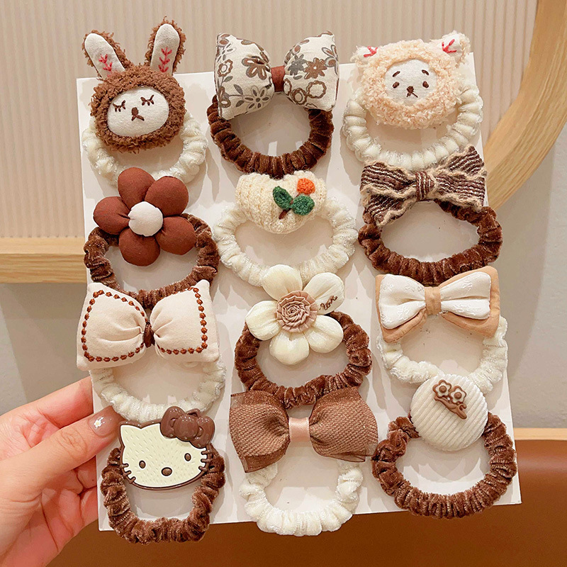 Niños cuerdas de cabello dulces niñas de alto valor facial color café leche de alta elasticidad cuerdas de cabello de cabello de cola de caballo de niña