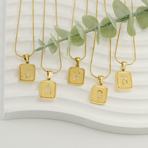Cross-border European and American titanium steel pressed sand hollow letter pendant 26 English letters snake bone chain 18K stainless steel necklace for women