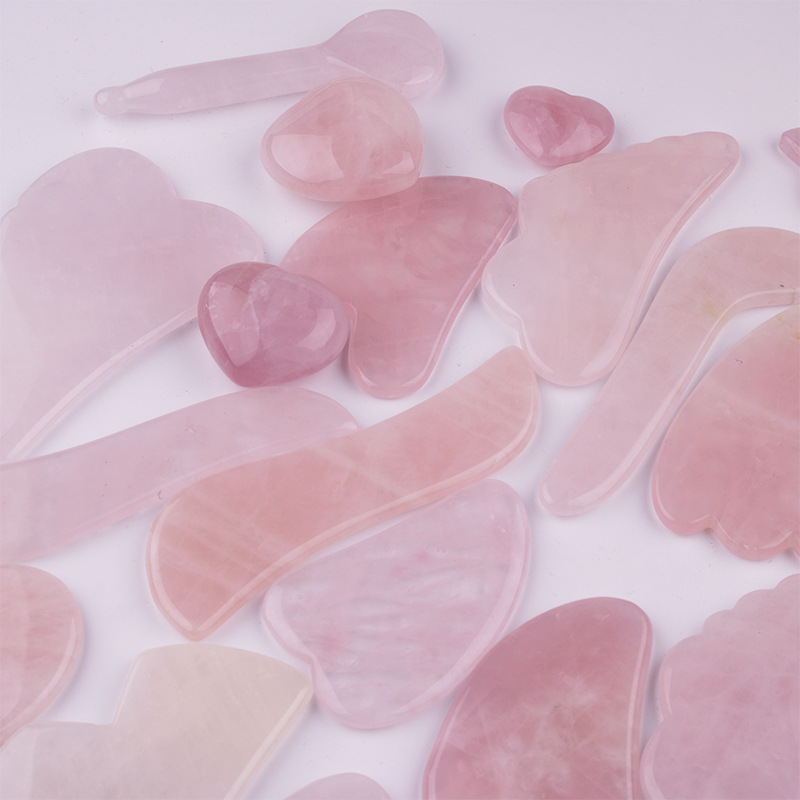 Venta directa de fábrica polvo de cristal en forma de corazón raspado Xiuyu Jade rodillo masajeador facial masaje de belleza en stock al por mayor