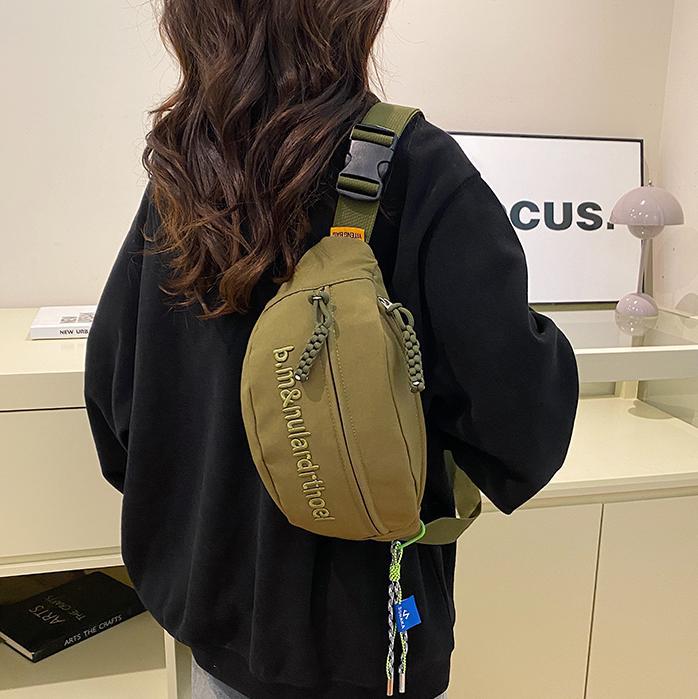 Bolsa de lona para mujeres 2025, nuevo estilo coreano de bolso de mochila deportiva casual popular, bolso de pecho de fuego, bolso de cintura de alta calidad