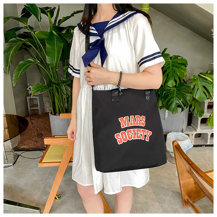 Canvas bag for women, single shoulder, ins crossbody, laid-back style, college student class bag, artistic Japanese style, large capacity, Hong Kong style, chic undefined